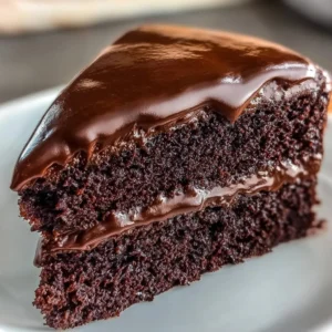 Deliciously rich Chocolate Craving Cake topped with chocolate ganache.