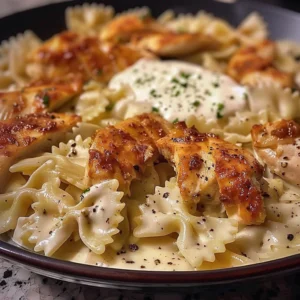 Creamy Mozzarella Garlic Butter Chicken with bowtie pasta dish