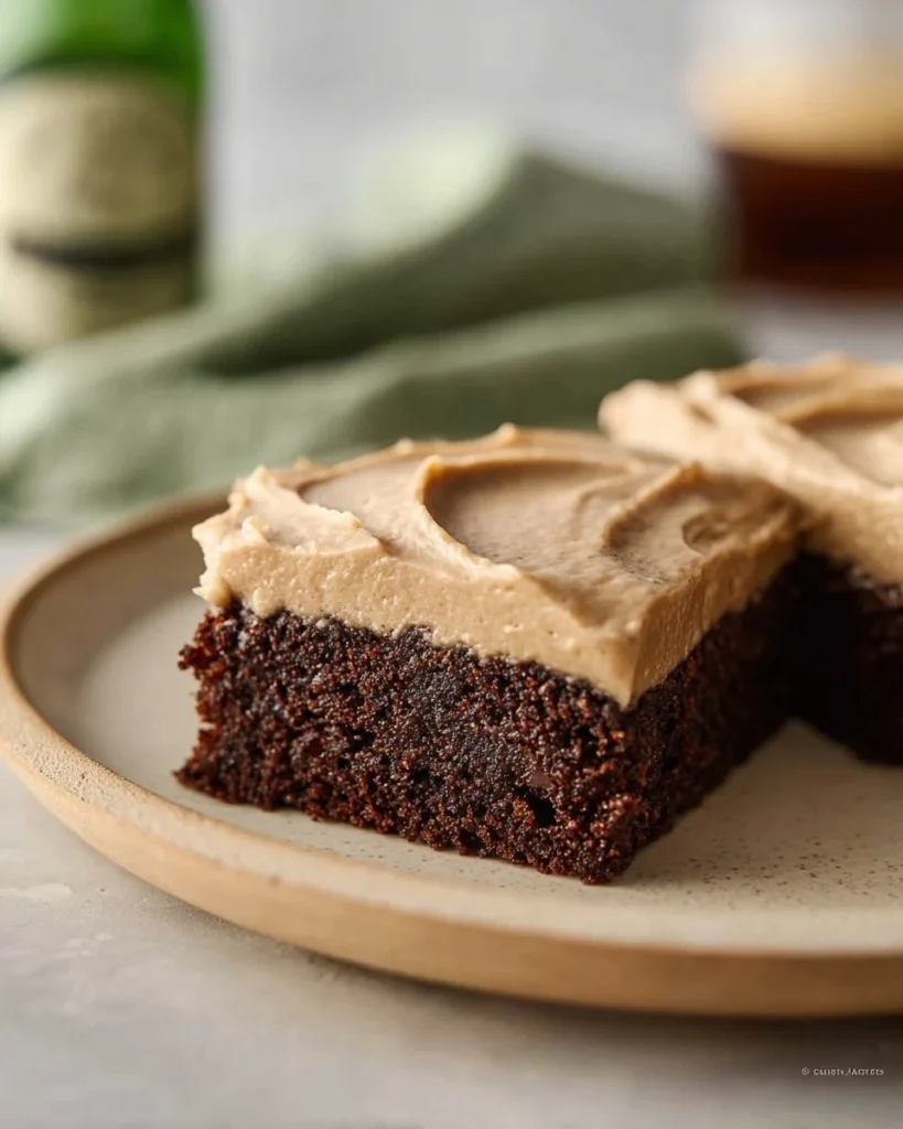 Delicious Guinness brownies topped with creamy frosting, perfect for dessert.