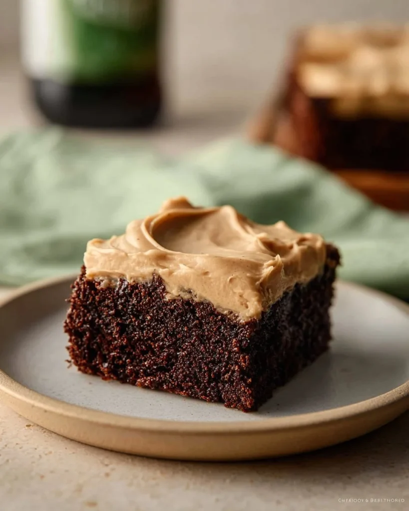Delicious Guinness brownies with rich Guinness frosting on a plate.