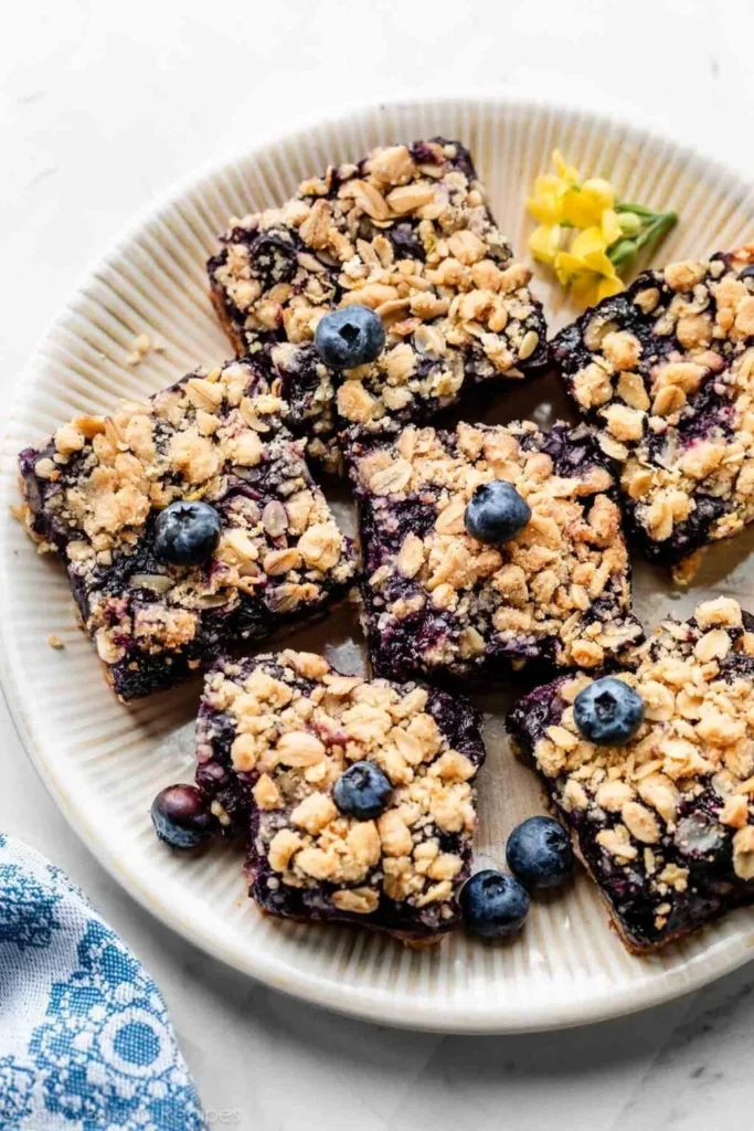 Delicious blueberry pie bars with a crumbly crust and juicy blueberry filling
