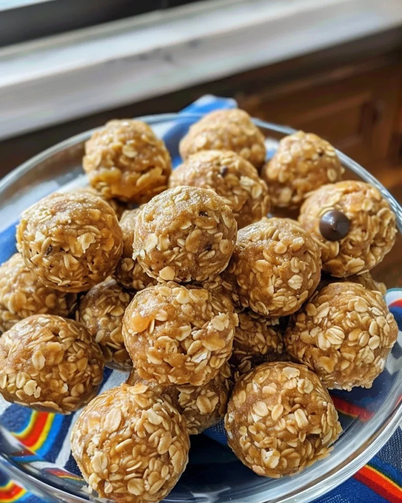 Delicious homemade peanut butter balls on a plate ready to enjoy.